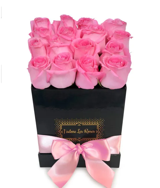 pink roses in black small box