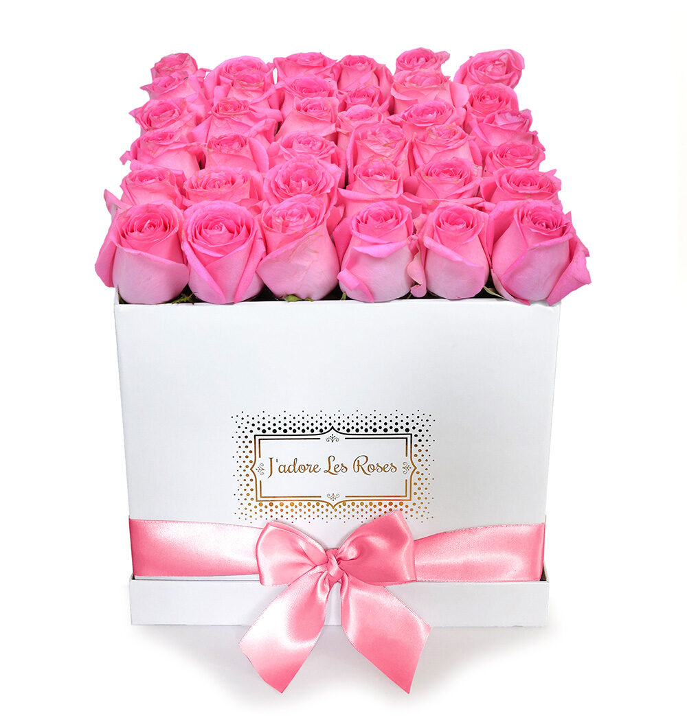 pink roses in white medium box