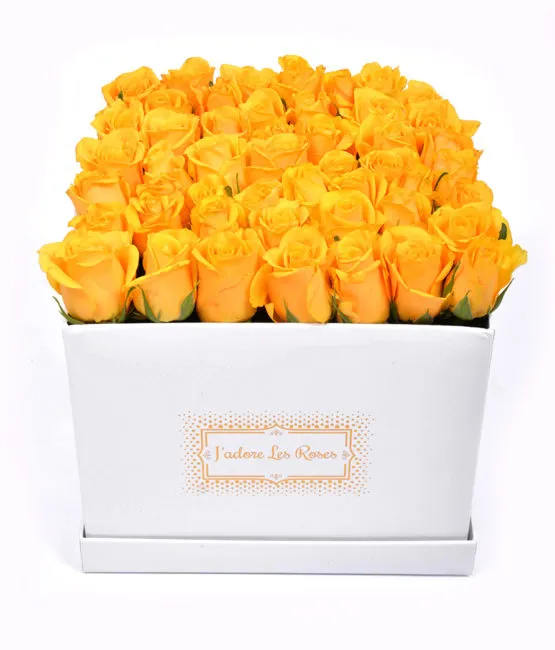 yellow roses in white medium box
