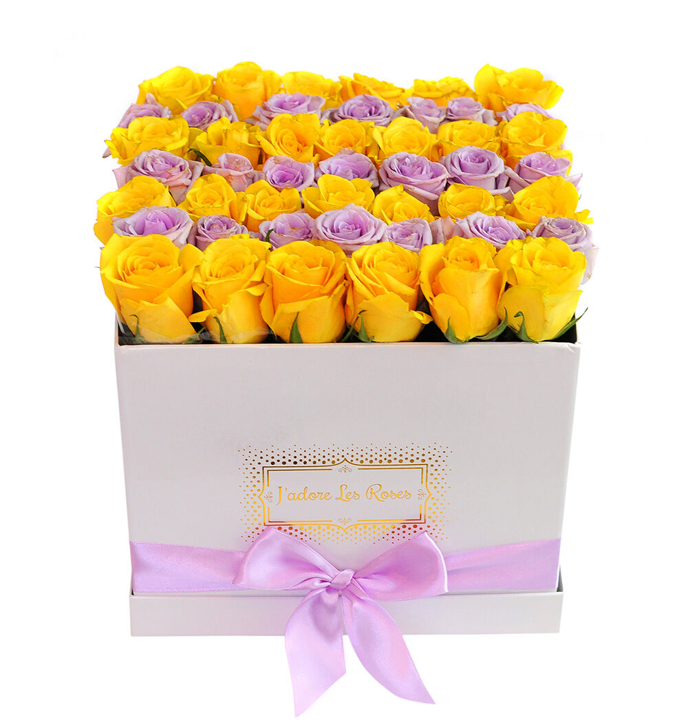 yellow and purple roses in white medium box