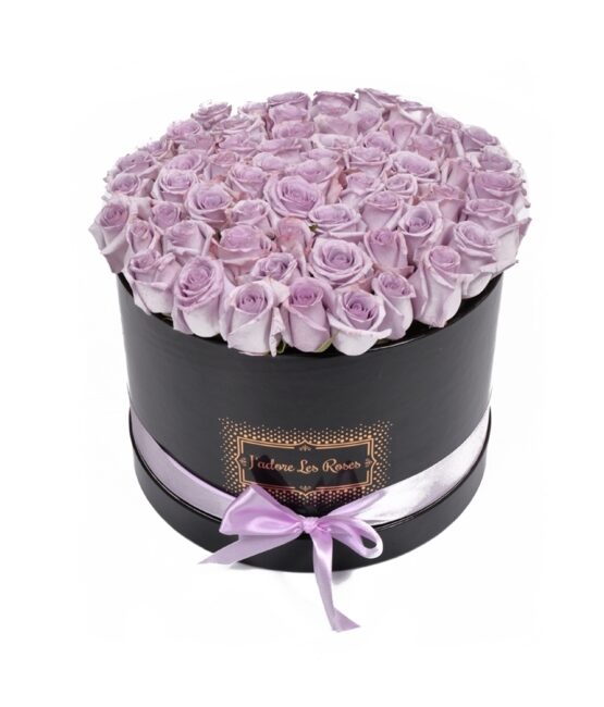 purple roses in black round box