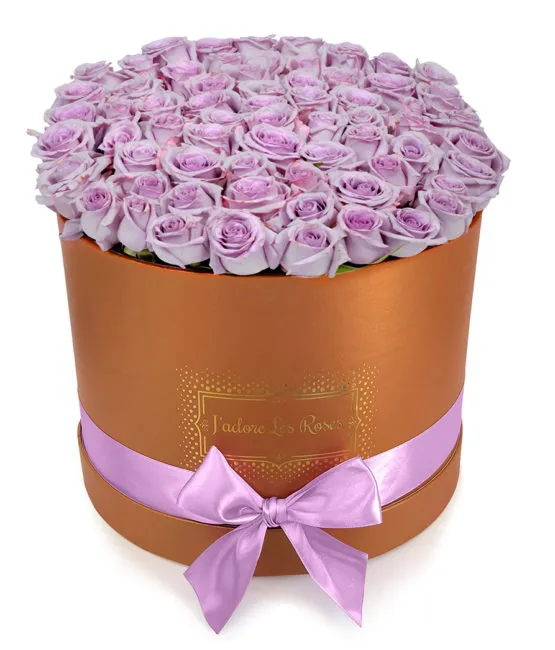 purple roses in bronze round box