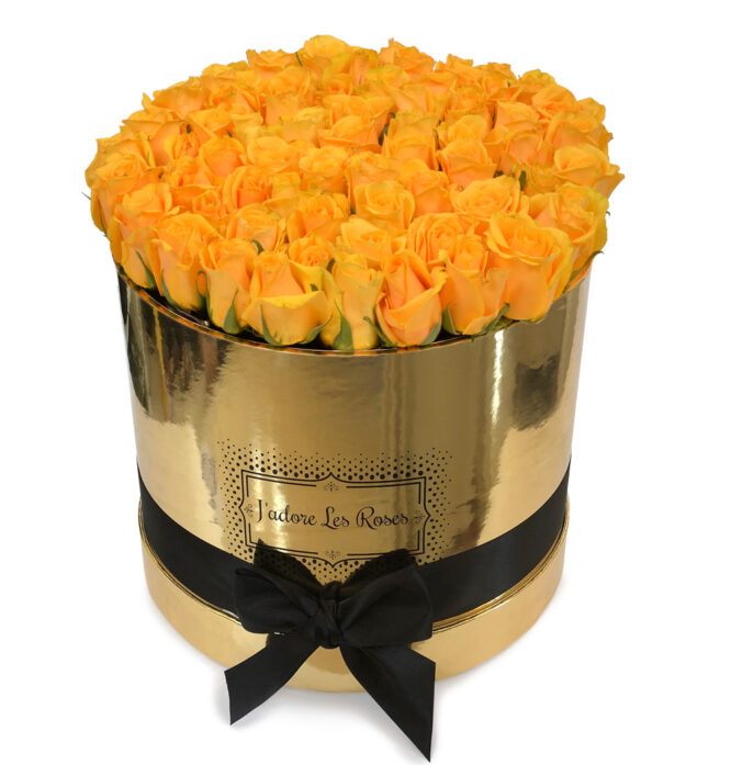 yellow roses in gold round box