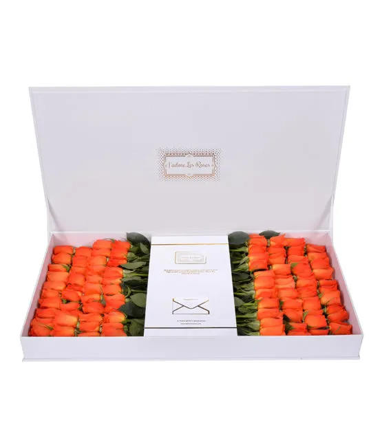 orange roses in white large box