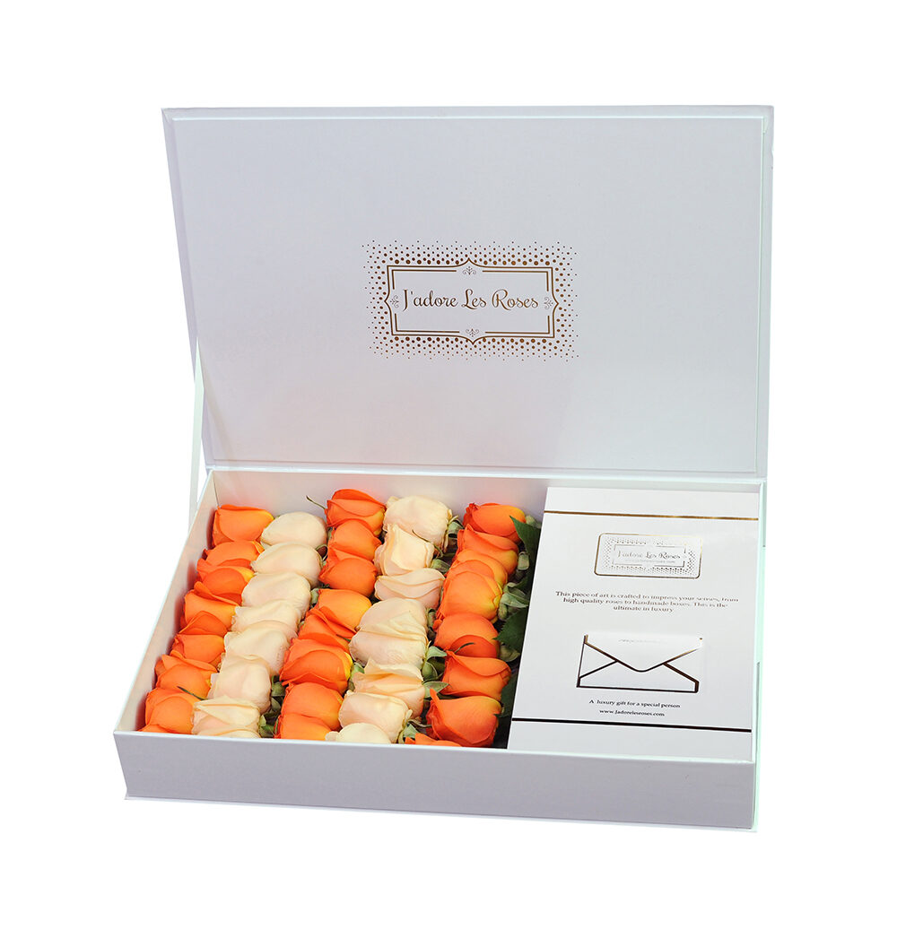 orange peach roses in white box