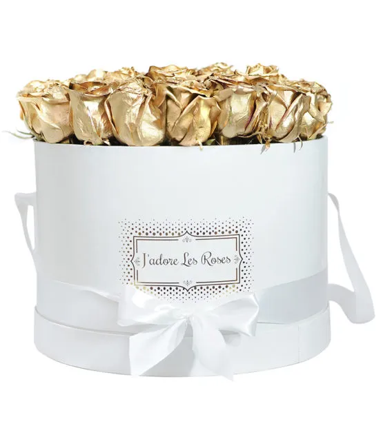 Gold roses in white round box