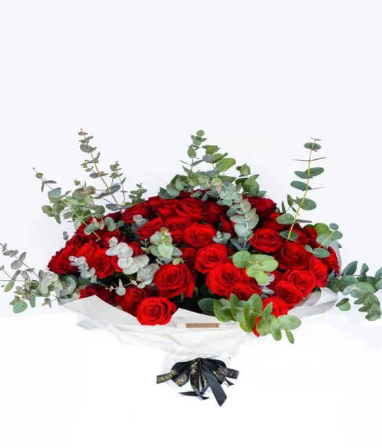 red roses with eucalyptus